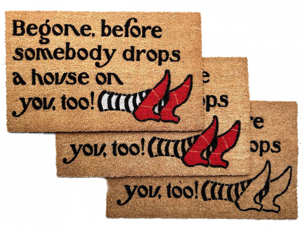 Begone, before somebody drops a house on you, too! Wizard Oz mat ruby slippers