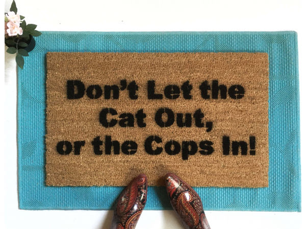 dont let the cats out or the cops in funny doormat