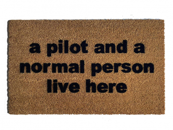 A pilot and a normal person live here, funny aviation doormat