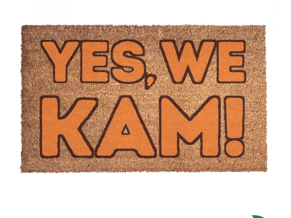 coir doormat reading "Yes we Kam!" in bright orange